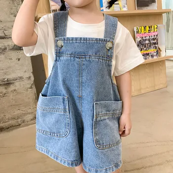 Годишният модерен детски деним гащеризон в корейски стил, обикновена къси панталони с големи джобове за момичета, всекидневни свободен универсален детски гащеризон